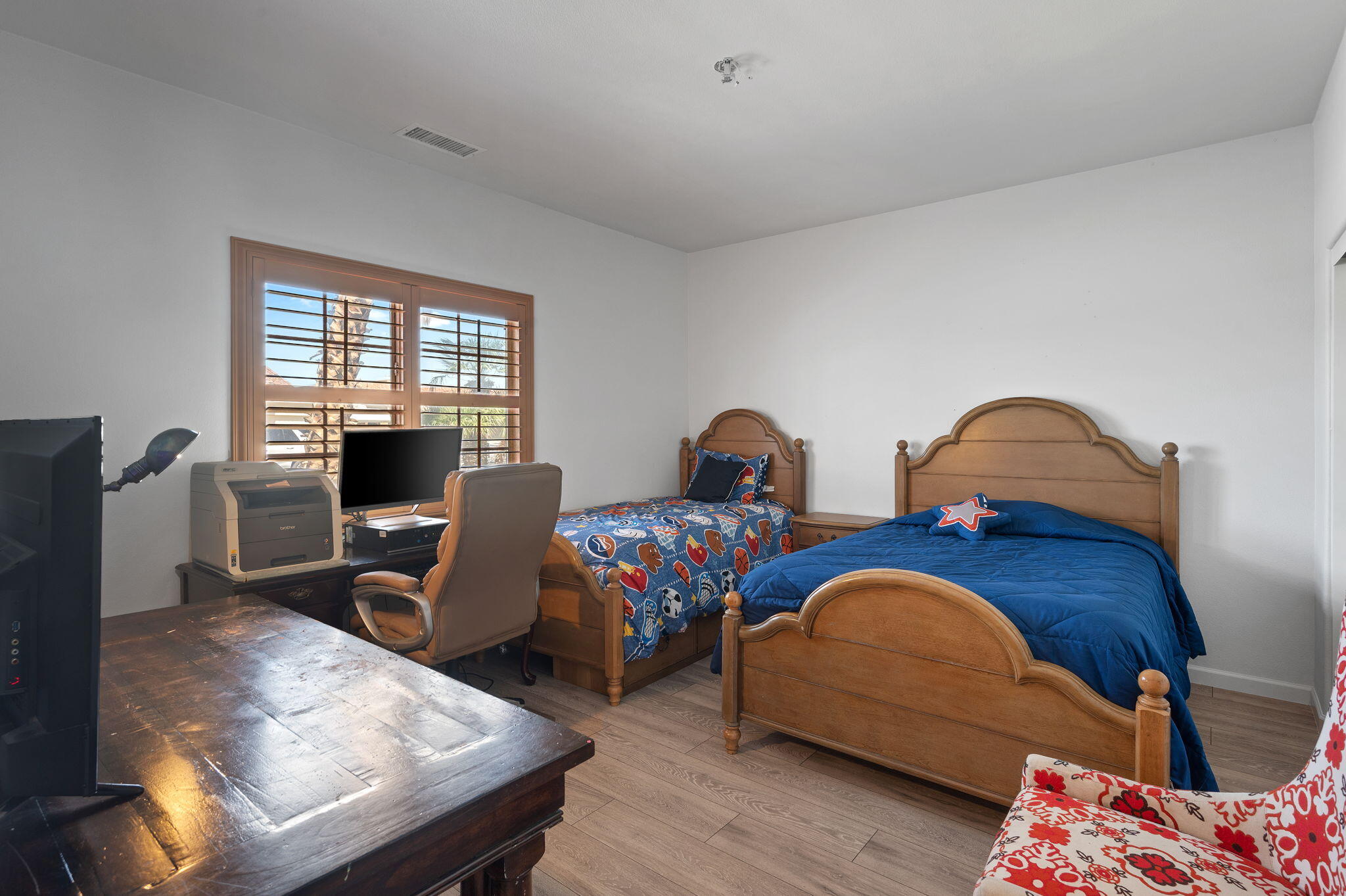 83035 Exeter Court Thermal, CA 92274 - Photo 21 of 38 a bedroom with furniture and a window