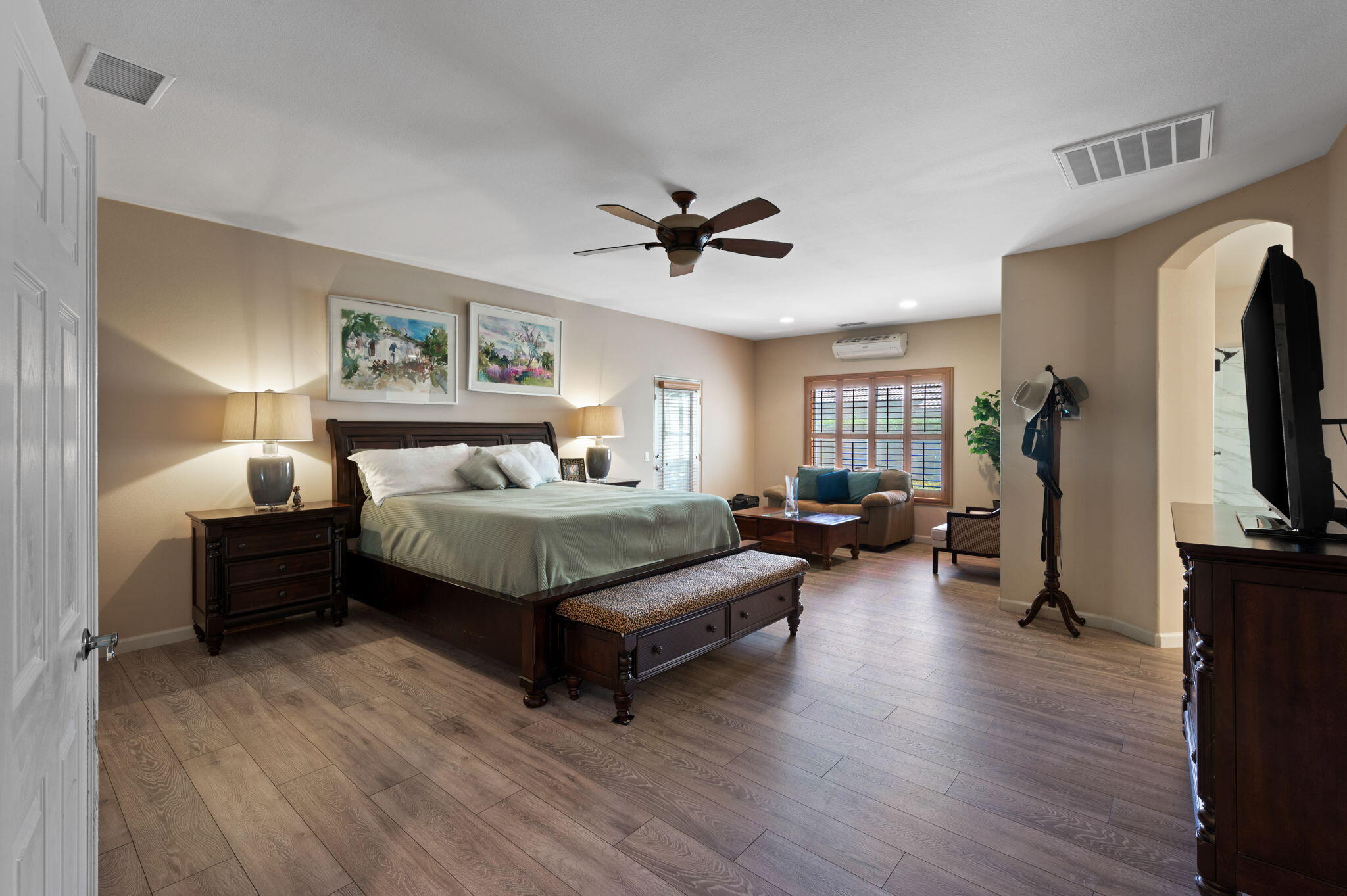 83035 Exeter Court Thermal, CA 92274 - Photo 23 of 38 a bedroom with furniture window and wooden floor