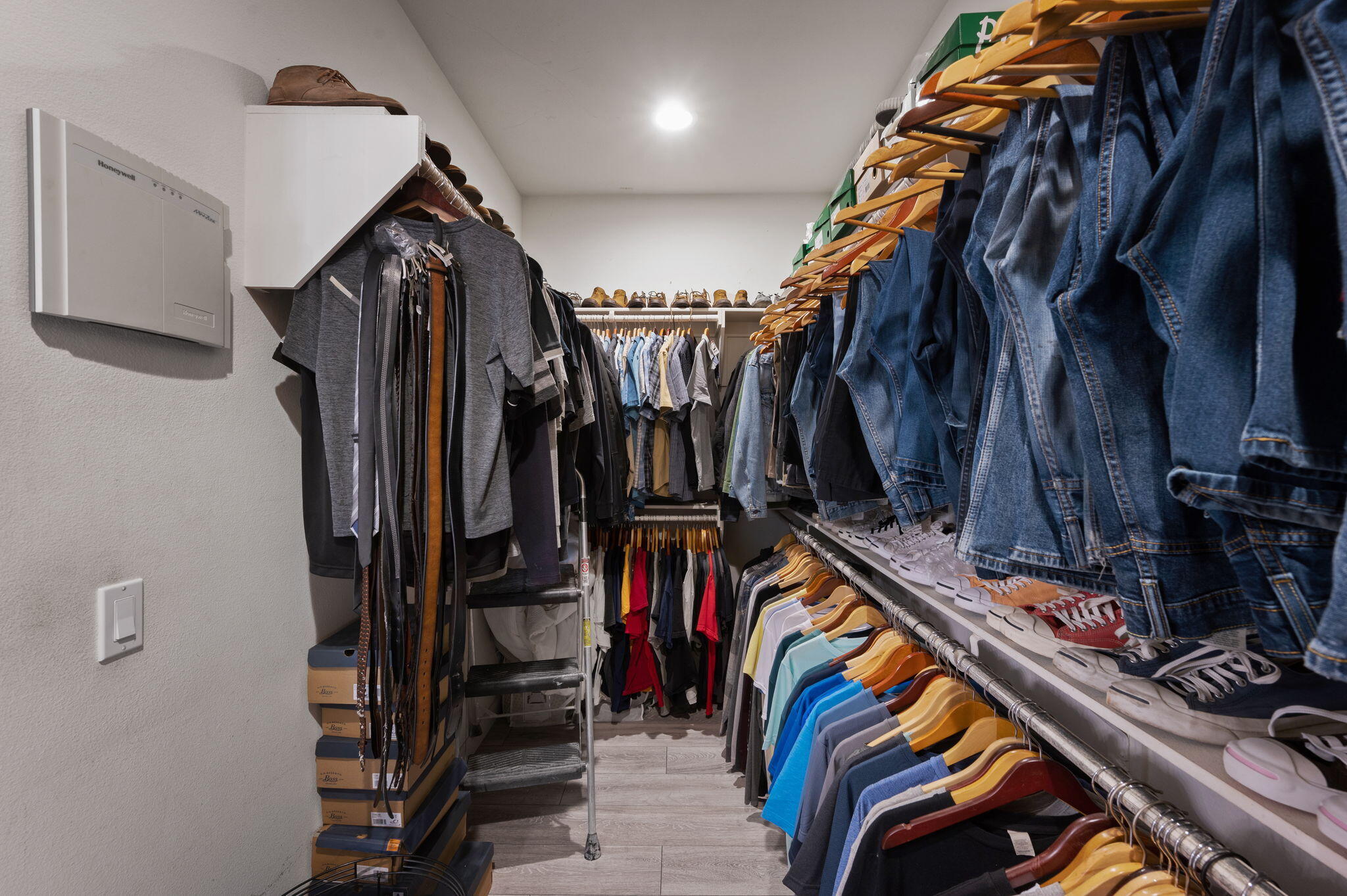 83035 Exeter Court Thermal, CA 92274 - Photo 29 of 38 a view of walk in closet with clothes