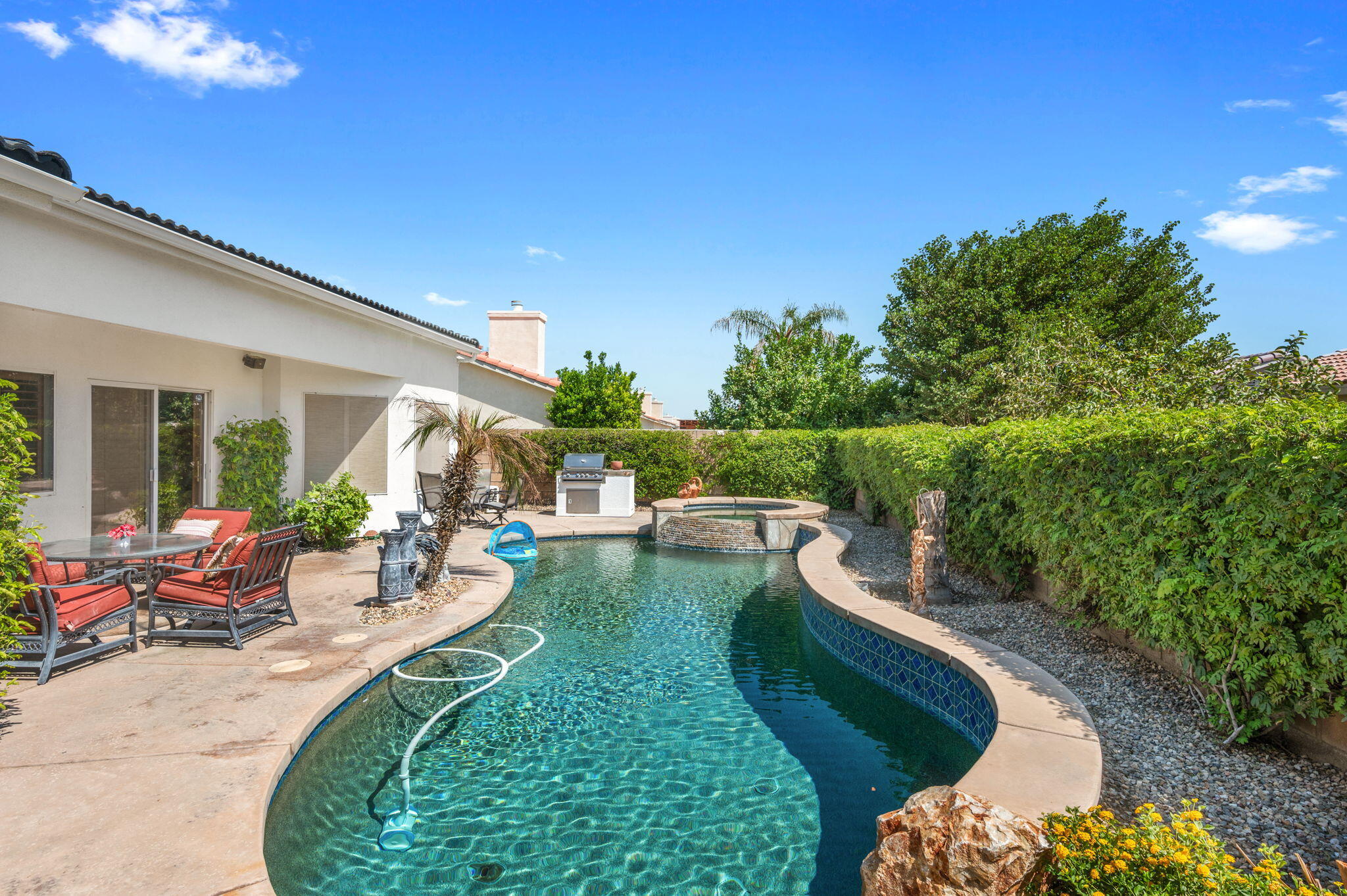 83035 Exeter Court Thermal, CA 92274 - Photo 34 of 38 a view of a backyard with plants and a patio