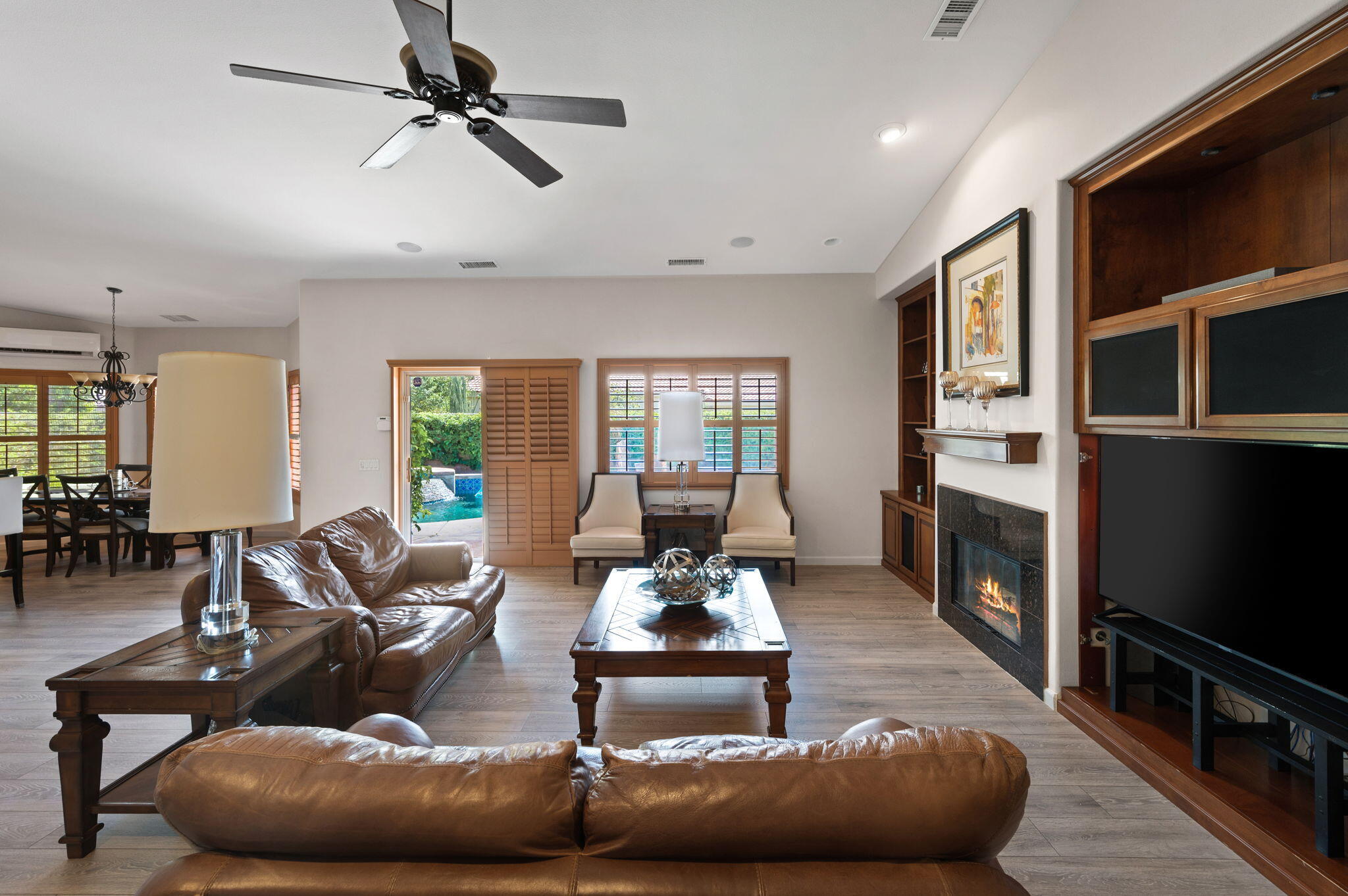 83035 Exeter Court Thermal, CA 92274 - Photo 5 of 38 a living room with furniture and a fireplace