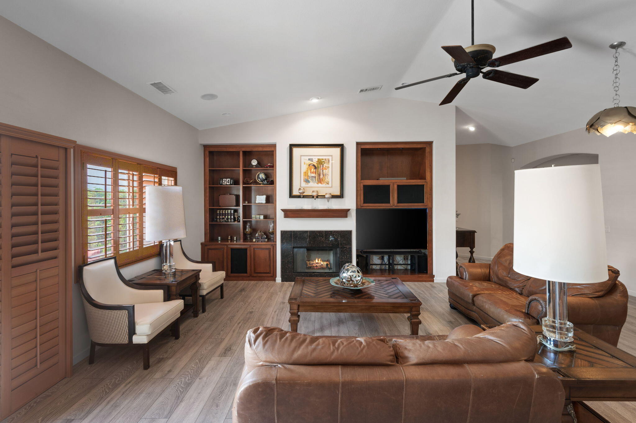 83035 Exeter Court Thermal, CA 92274 - Photo 7 of 38 a living room with furniture flat screen tv and window