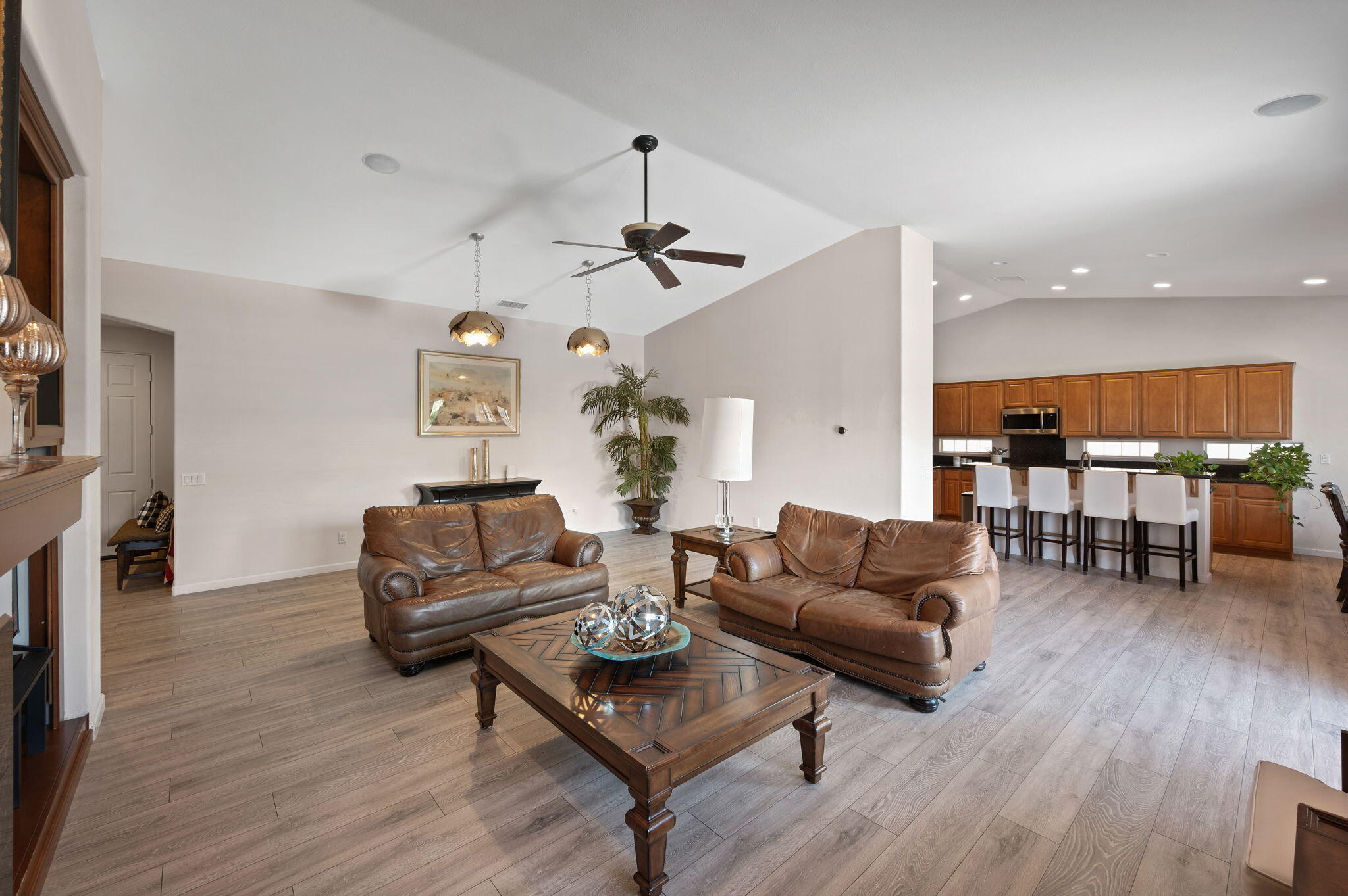 83035 Exeter Court Thermal, CA 92274 - Photo 9 of 38 a living room with furniture and wooden floor