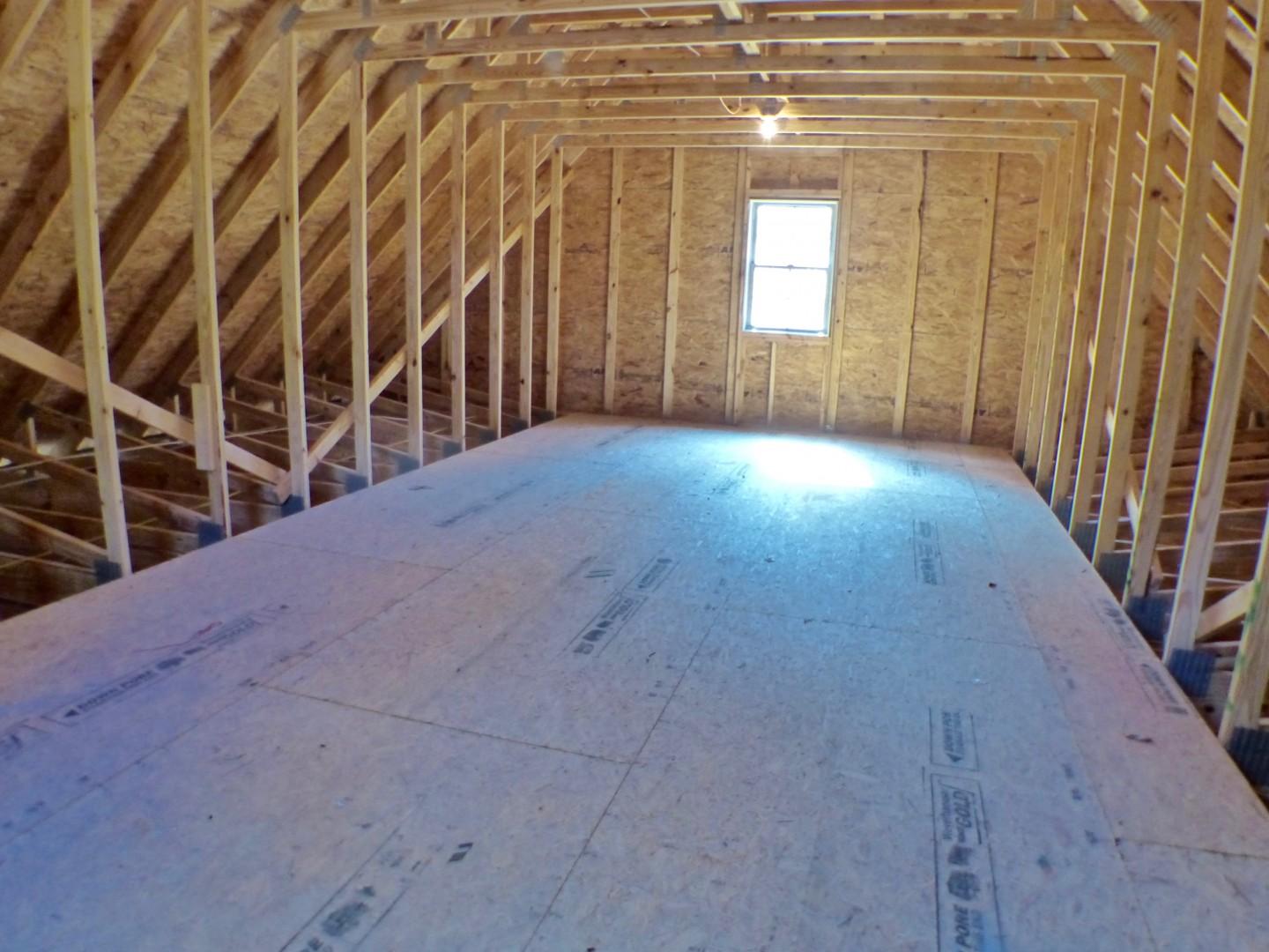 1412 McDuffie Road Biscoe, NC 27209 - Photo 25 of 30 There is great floored attic space with metal pull down ladder above the garage. Large enough to make living space.