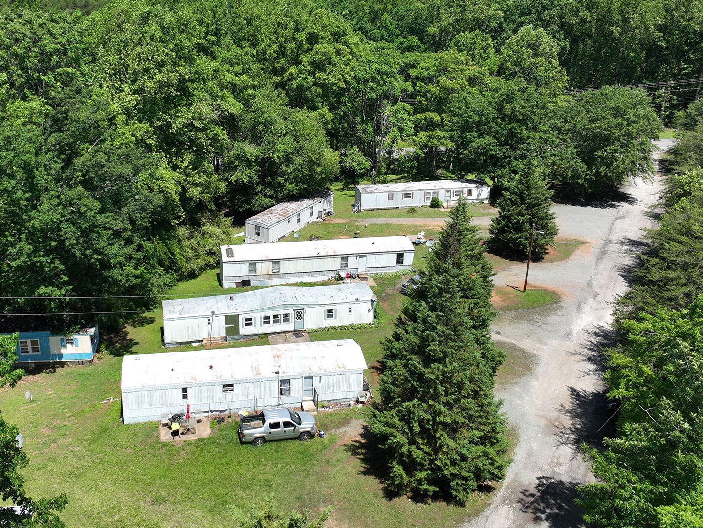 112 Ramsey Road Gretna, VA 24557 - Photo 3 of 9 an aerial view of a house with a garden