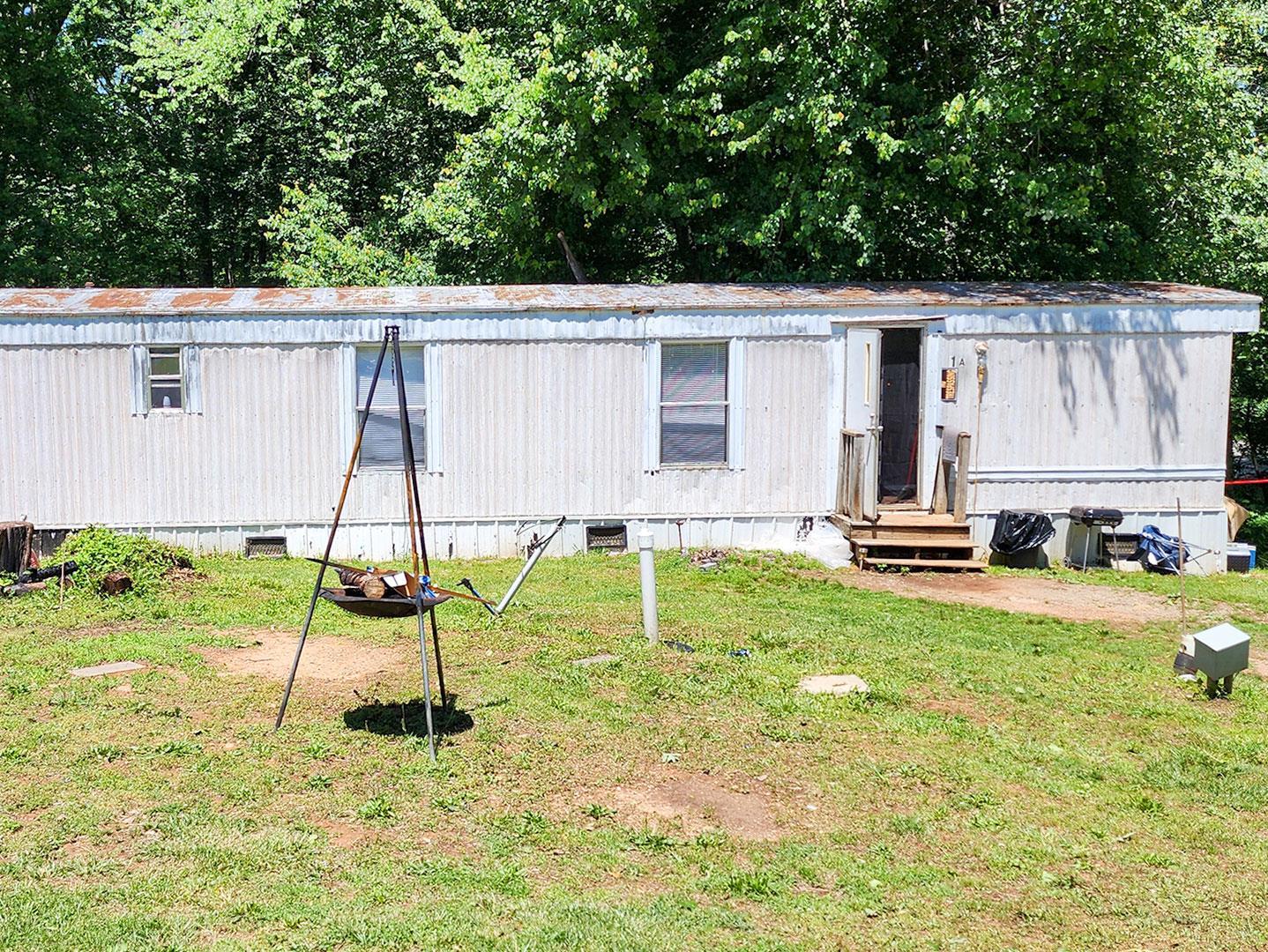 112 Ramsey Road Gretna, VA 24557 - Photo 5 of 9 a house view with a backyard space