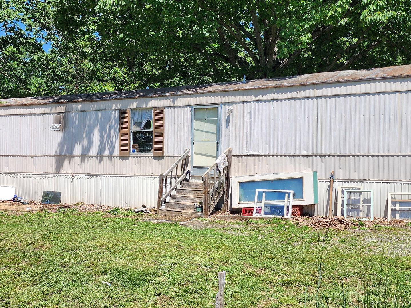 112 Ramsey Road Gretna, VA 24557 - Photo 8 of 9 a view of house with backyard