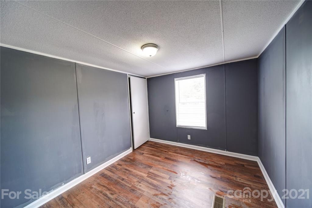 283 Ballard Spring Road, Unit 3276 Morven, NC 28119 - Photo 36 of 48 a view of empty room with window