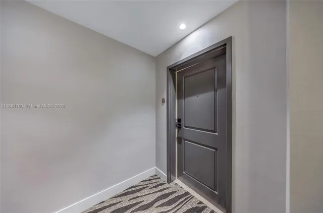 a view of hallway with closet