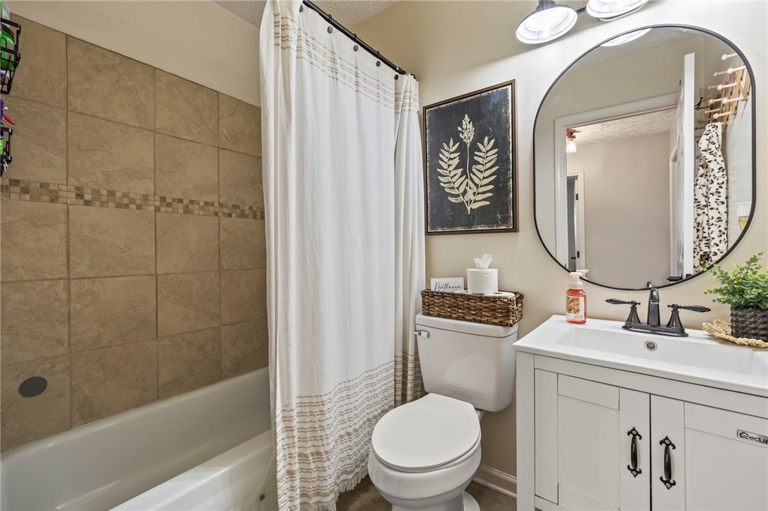 8969 Franklin-Trenton Road Franklin, OH 45005 - Photo 45 of 49 This updated bathroom offers a tiled shower and a modern vanity for everyday comfort.