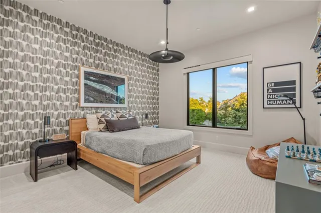 a living room with furniture or window and a chandelier