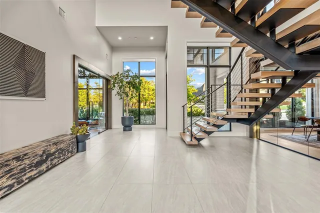 a bedroom with furniture and a wooden floor