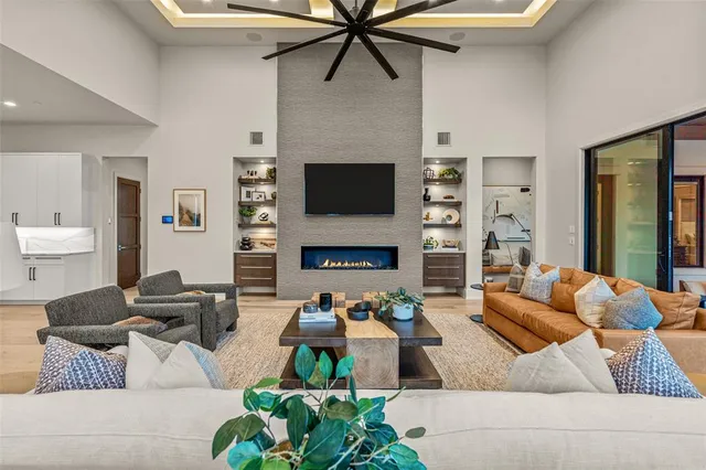 a large kitchen with a table and chairs in it