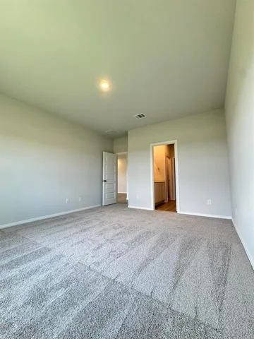 a kitchen with granite countertop a sink and cabinets