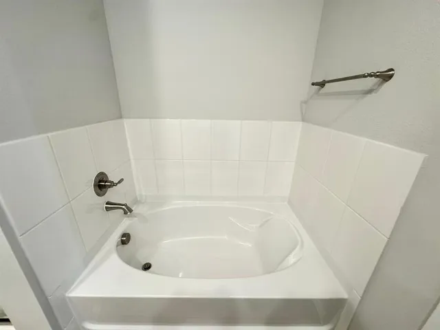 a bathroom with a toilet and a sink