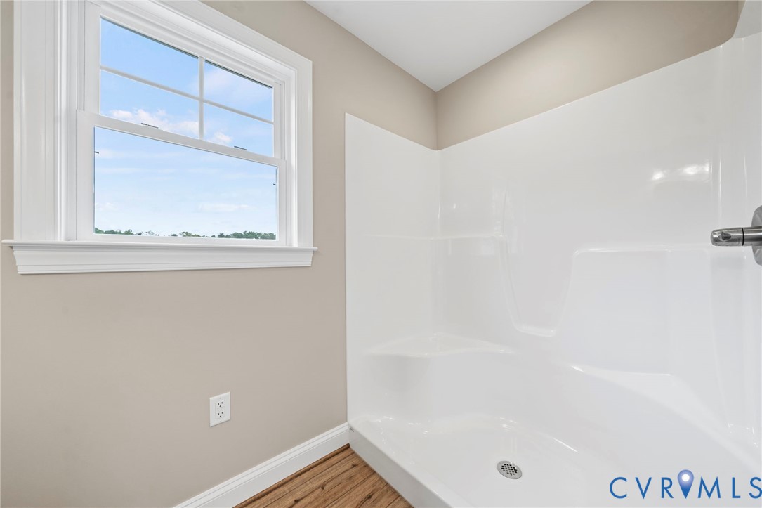 531 Salem Church Road Cumberland, VA 23040 - Photo 17 of 26 a bathroom with a bathtub