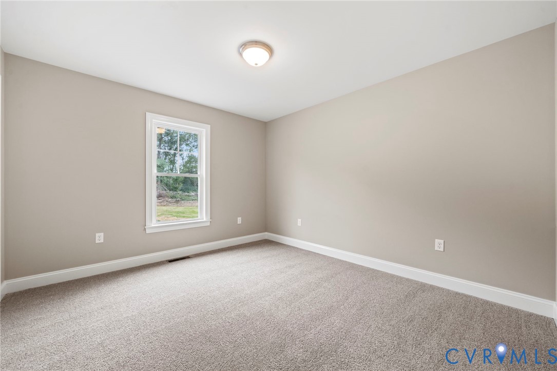 531 Salem Church Road Cumberland, VA 23040 - Photo 21 of 26 an empty room with windows