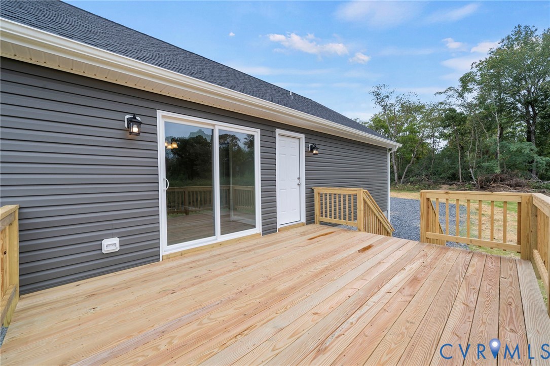 531 Salem Church Road Cumberland, VA 23040 - Photo 24 of 26 a view of a house with a roof deck