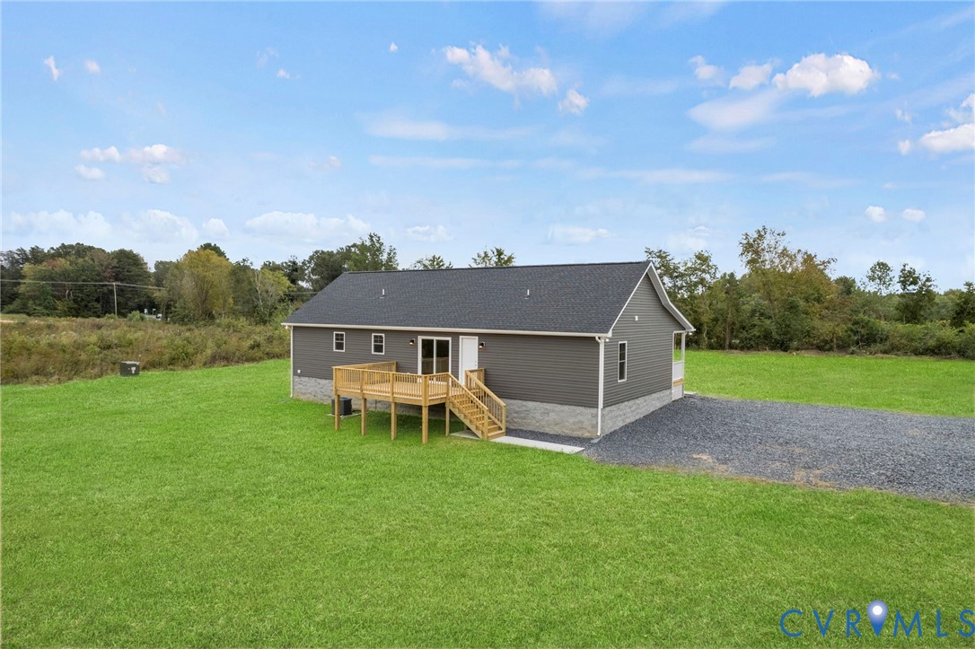 531 Salem Church Road Cumberland, VA 23040 - Photo 26 of 26 a view of a house with a yard and sitting area