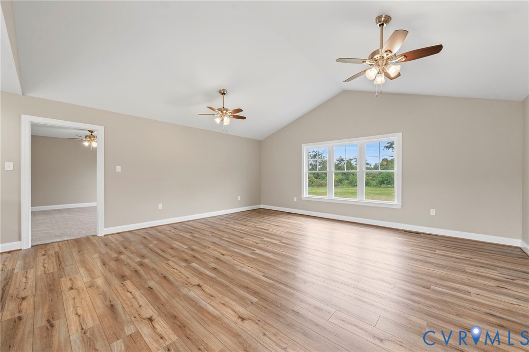 531 Salem Church Road Cumberland, VA 23040 - Photo 4 of 26 wooden floor in an empty room with a window