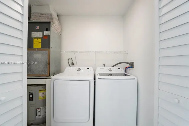 a front view of house with yard and outdoor seating