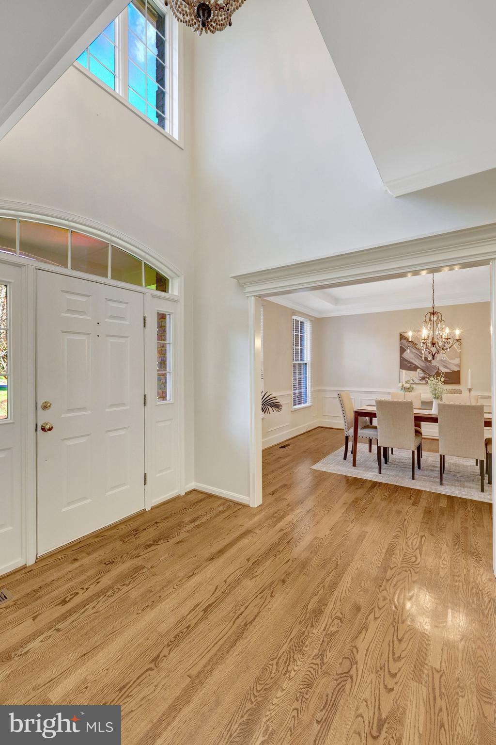 1827 Beulah Road Vienna, VA 22182 - Photo 11 of 91 a view of a livingroom with wooden floor and a ceiling fan