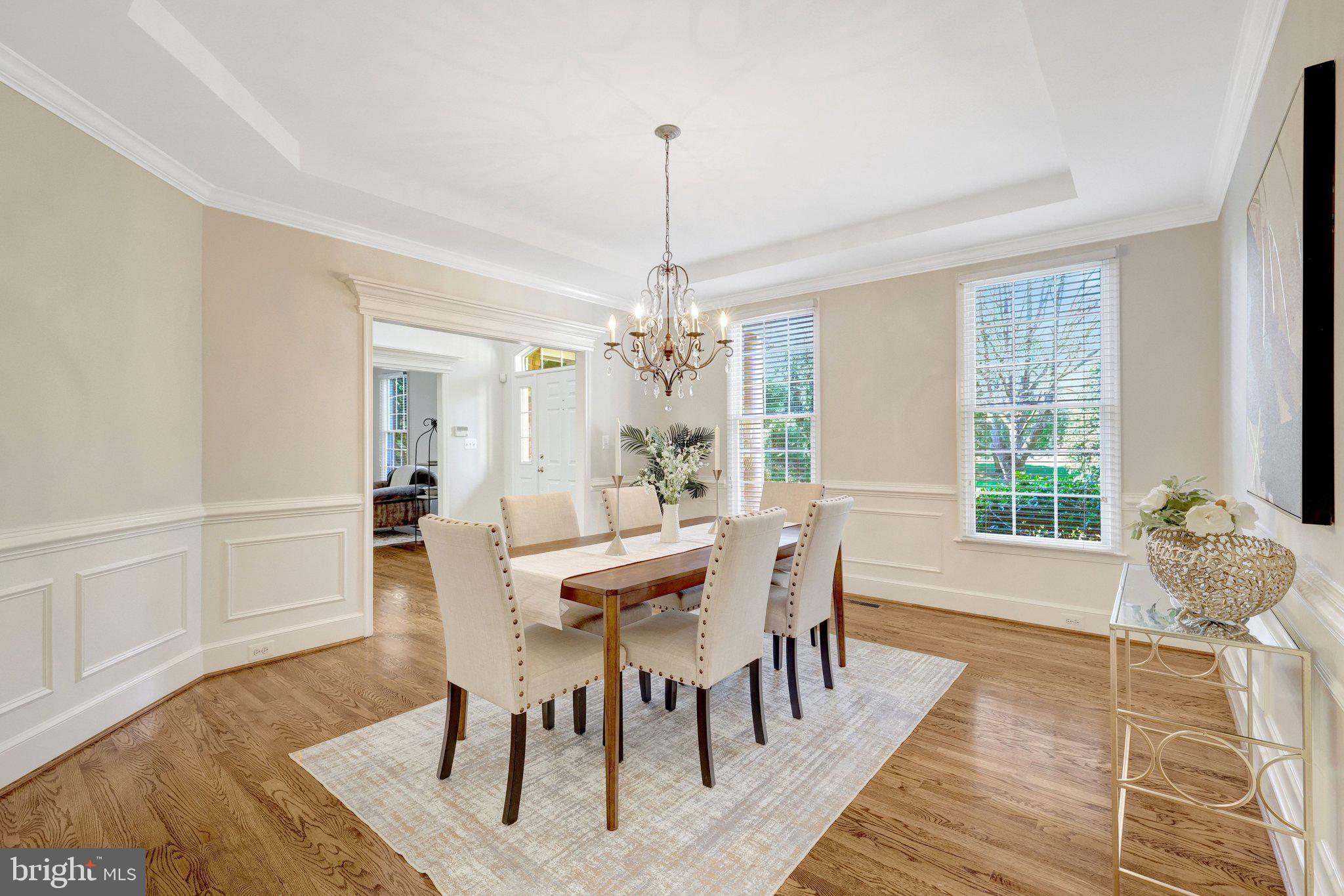 1827 Beulah Road Vienna, VA 22182 - Photo 16 of 91 a view of a dining room with furniture window and wooden floor