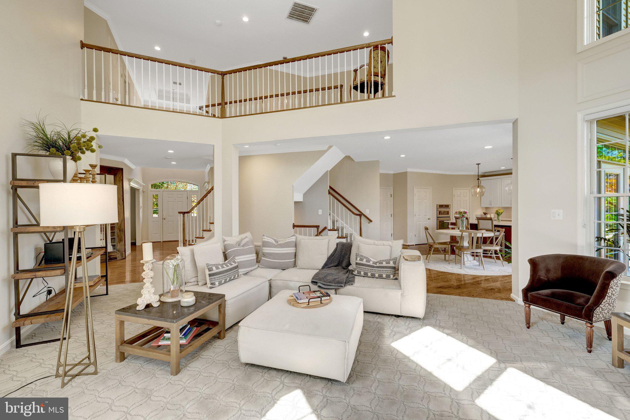 1827 Beulah Road Vienna, VA 22182 - Photo 22 of 91 a living room with furniture and a table