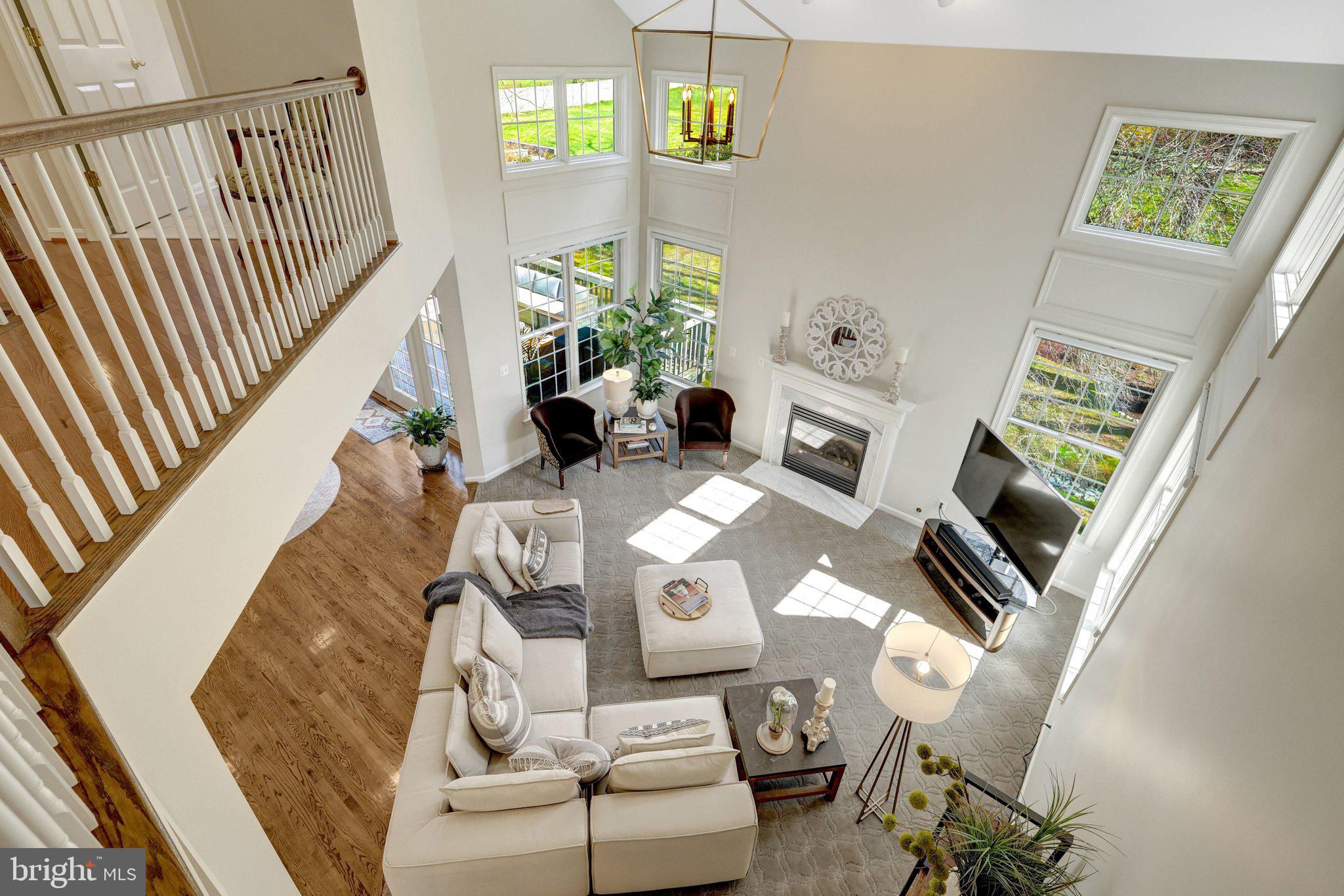 1827 Beulah Road Vienna, VA 22182 - Photo 37 of 91 a living room with furniture and a fireplace