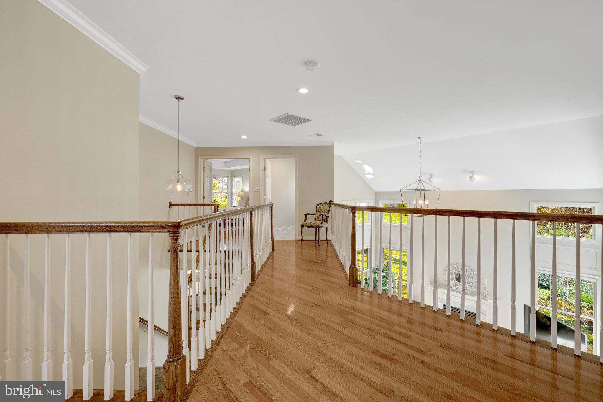 1827 Beulah Road Vienna, VA 22182 - Photo 39 of 91 a view of a hallway with wooden floor