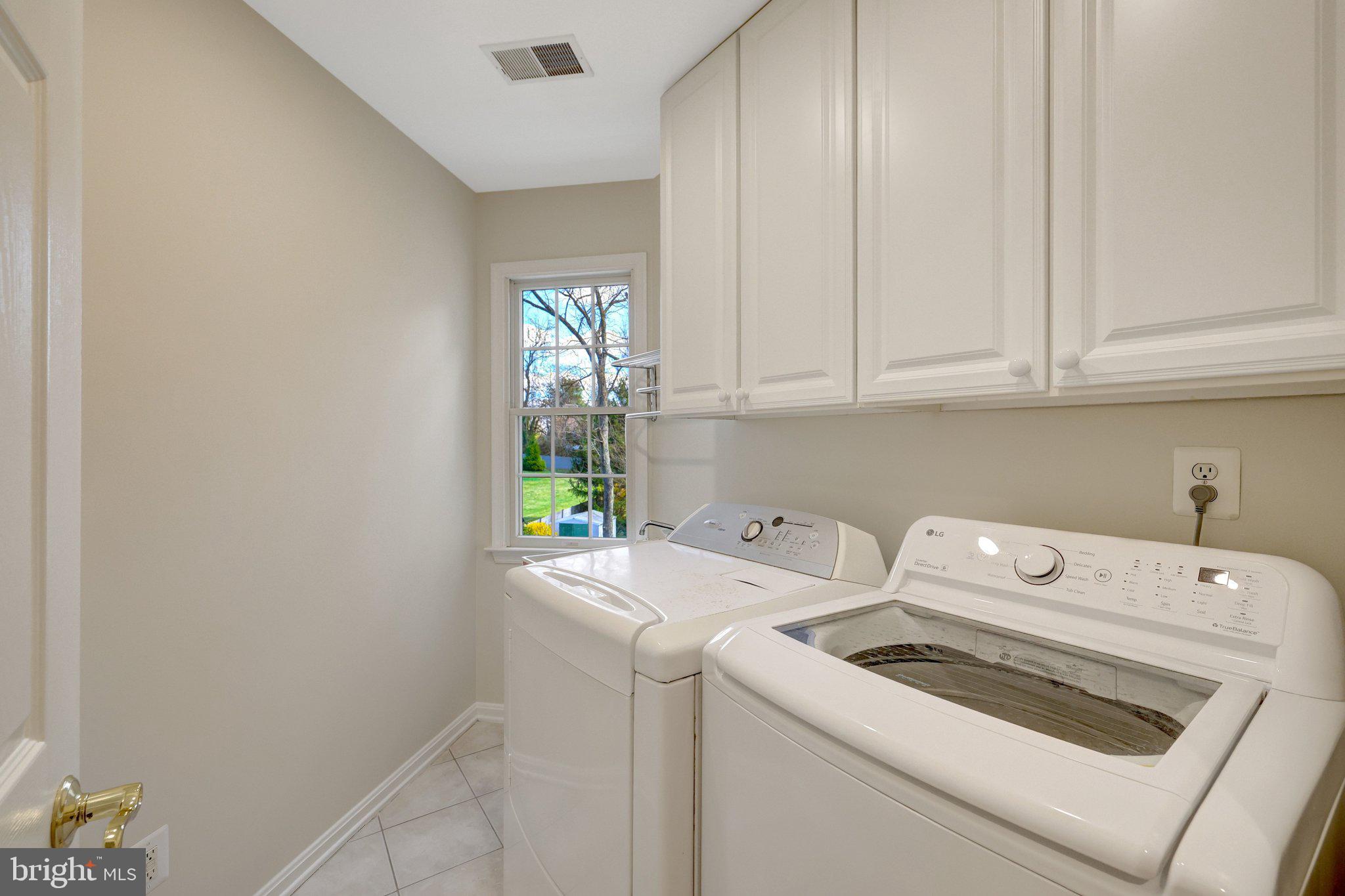 1827 Beulah Road Vienna, VA 22182 - Photo 40 of 91 a view of storage and utility room with washer and dryer