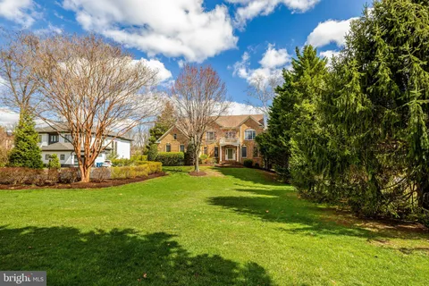 a view of yard with swimming pool