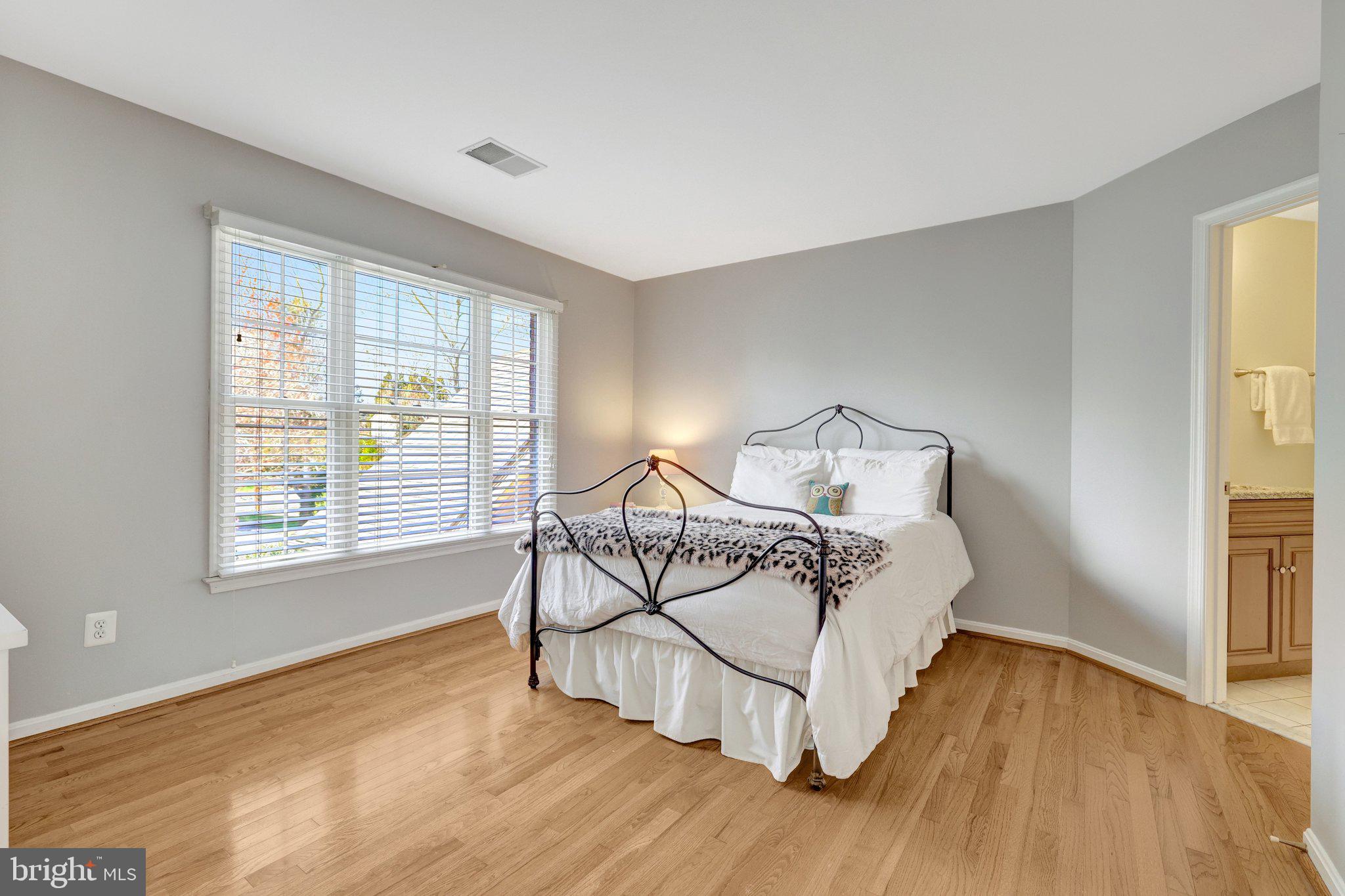 1827 Beulah Road Vienna, VA 22182 - Photo 47 of 91 a bedroom with a bed and a window