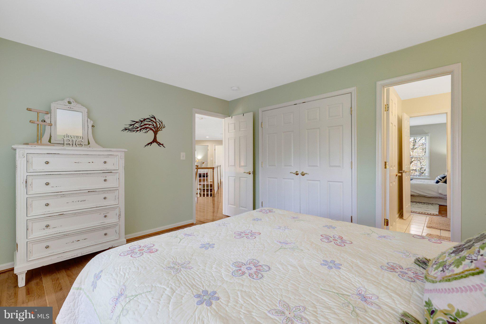 1827 Beulah Road Vienna, VA 22182 - Photo 52 of 91 a bedroom with a bed and a dresser
