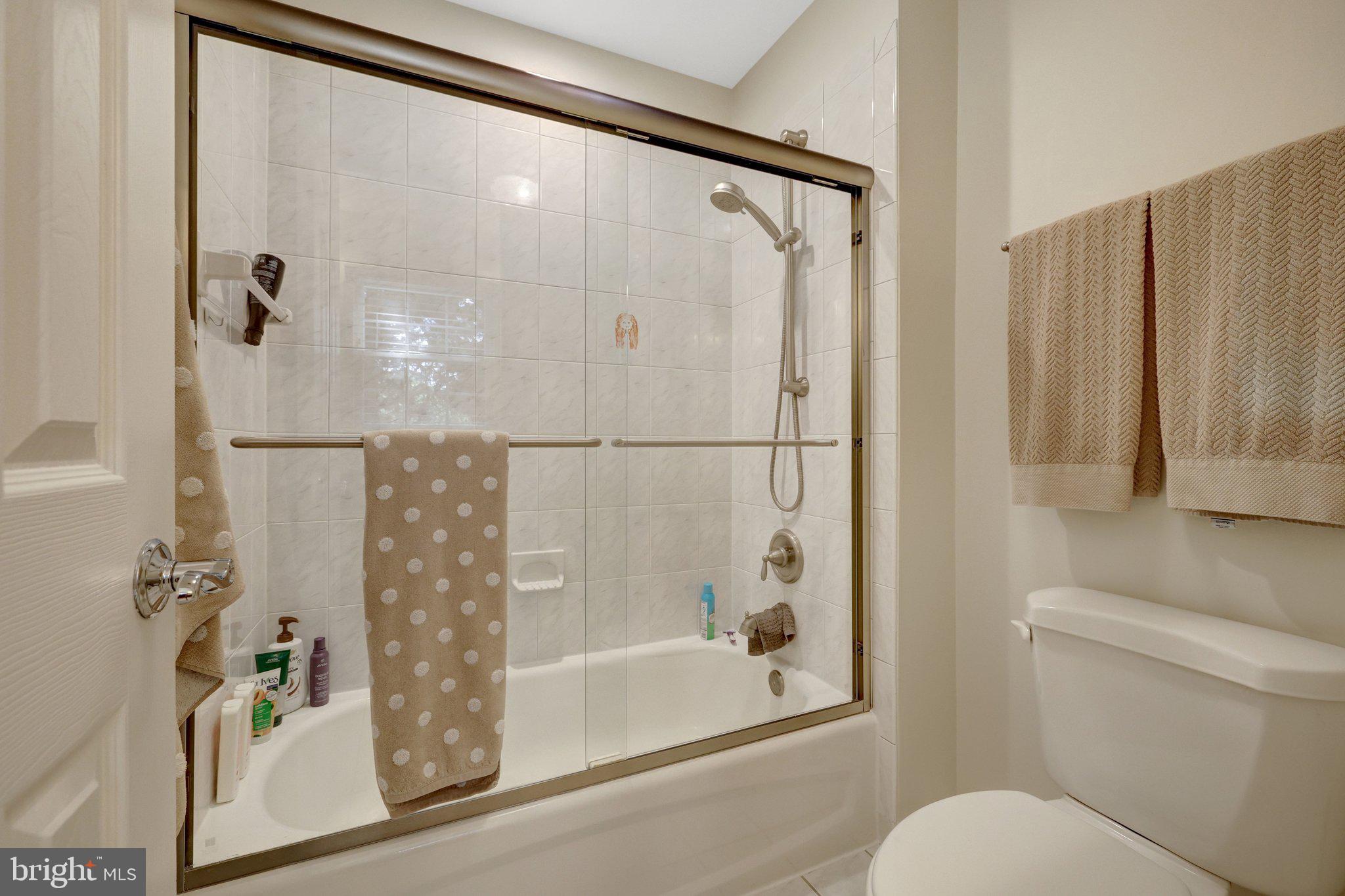 1827 Beulah Road Vienna, VA 22182 - Photo 54 of 91 a bathroom with a shower and a toilet