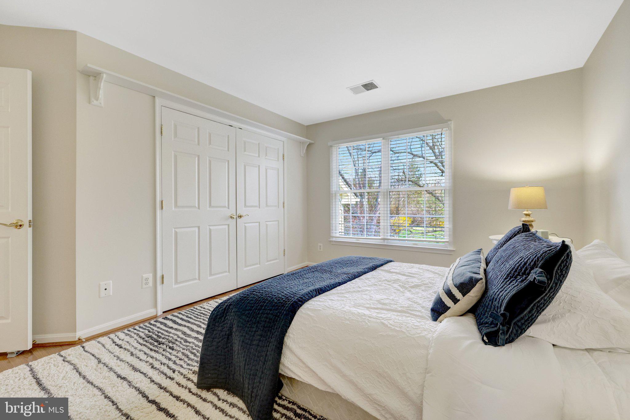 1827 Beulah Road Vienna, VA 22182 - Photo 55 of 91 a bedroom with a bed and a window