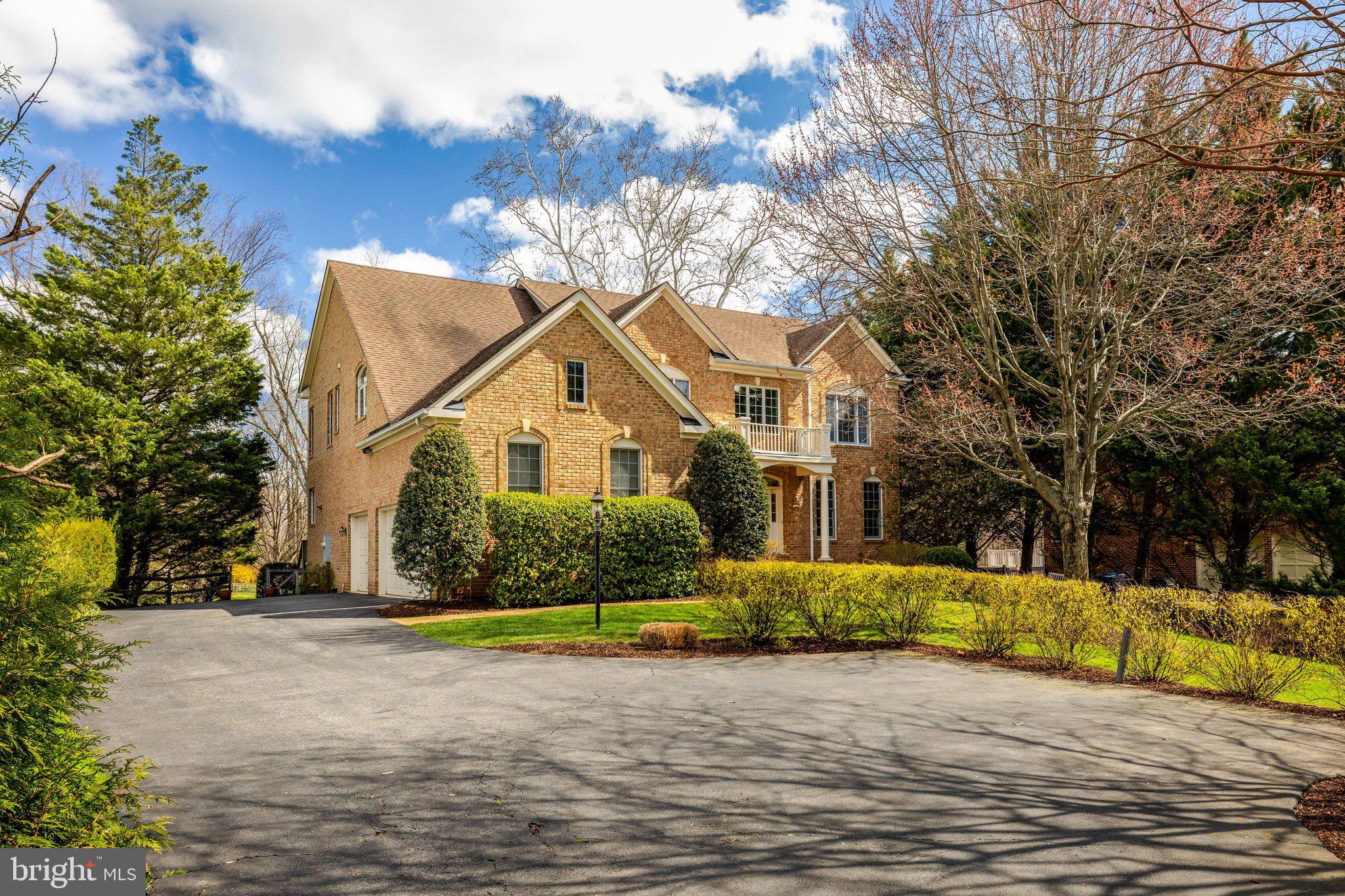 1827 Beulah Road Vienna, VA 22182 - Photo 7 of 91 a front view of a house with a yard