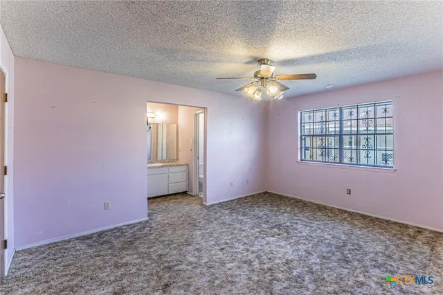 a view of an empty room with window