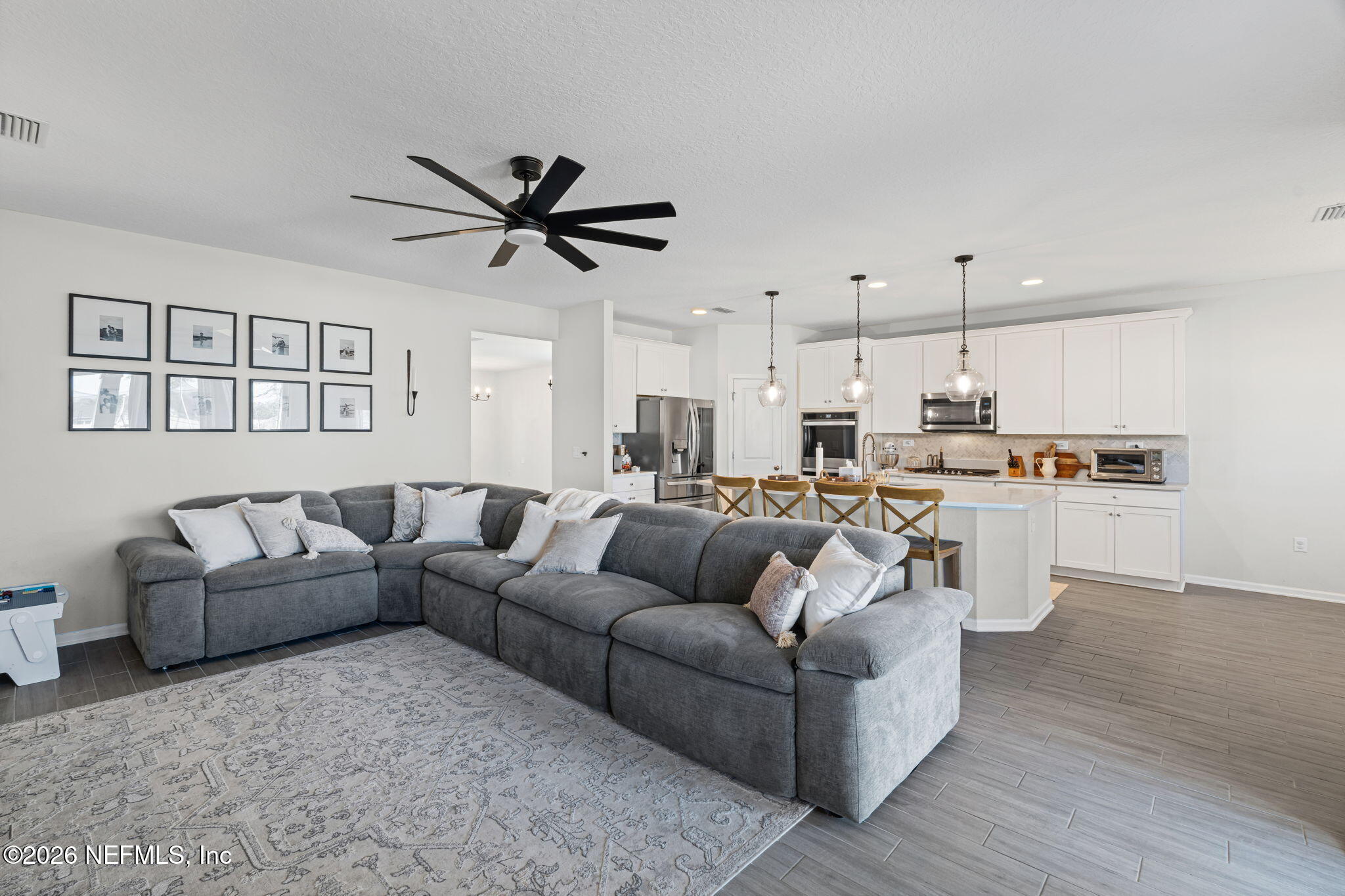 623 Ivory Palm Road Orange Park, FL 32073 - Photo 13 of 73 a living room with furniture and kitchen view