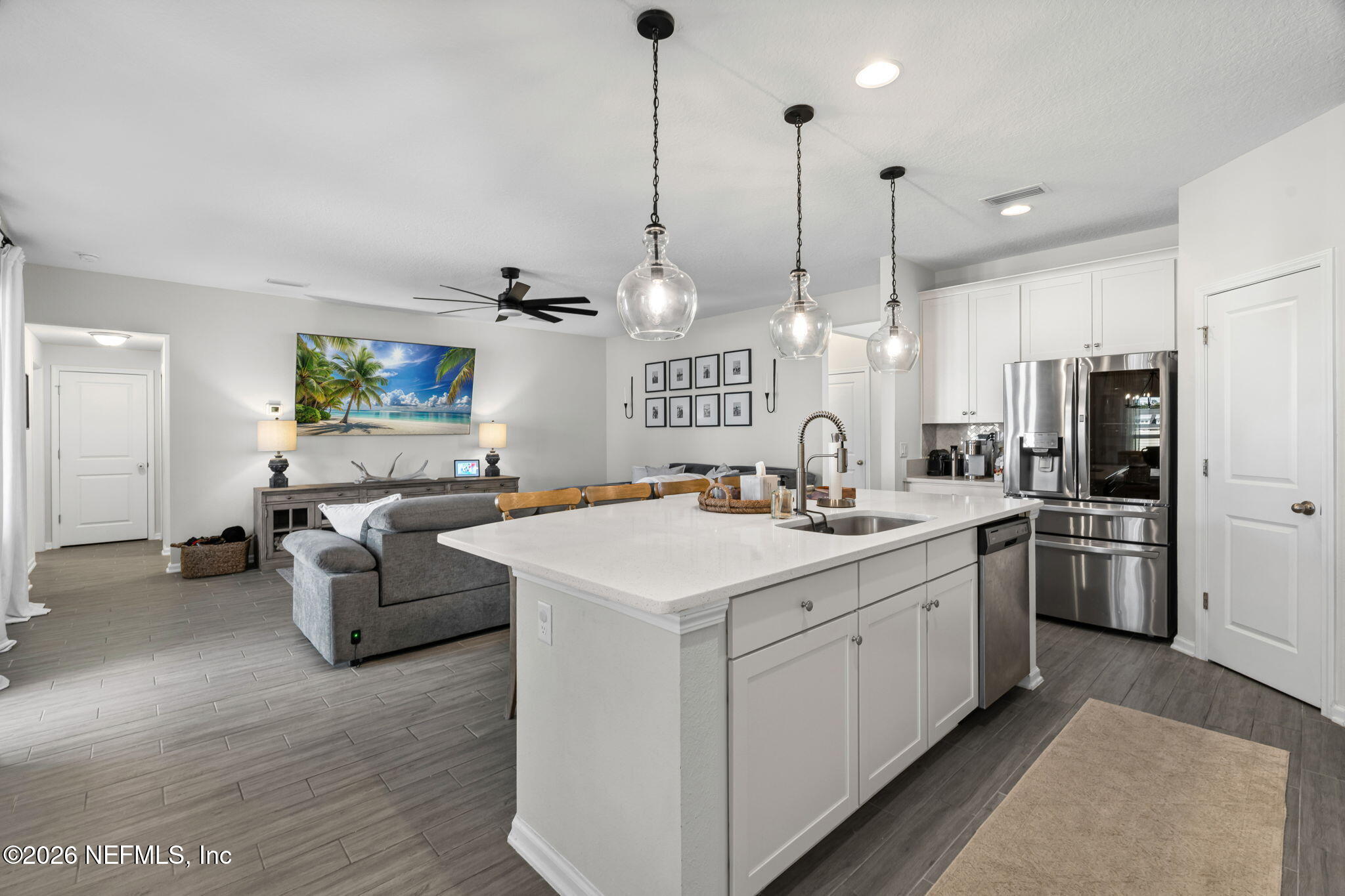 623 Ivory Palm Road Orange Park, FL 32073 - Photo 17 of 73 a kitchen with a sink counter top space and stainless steel appliances