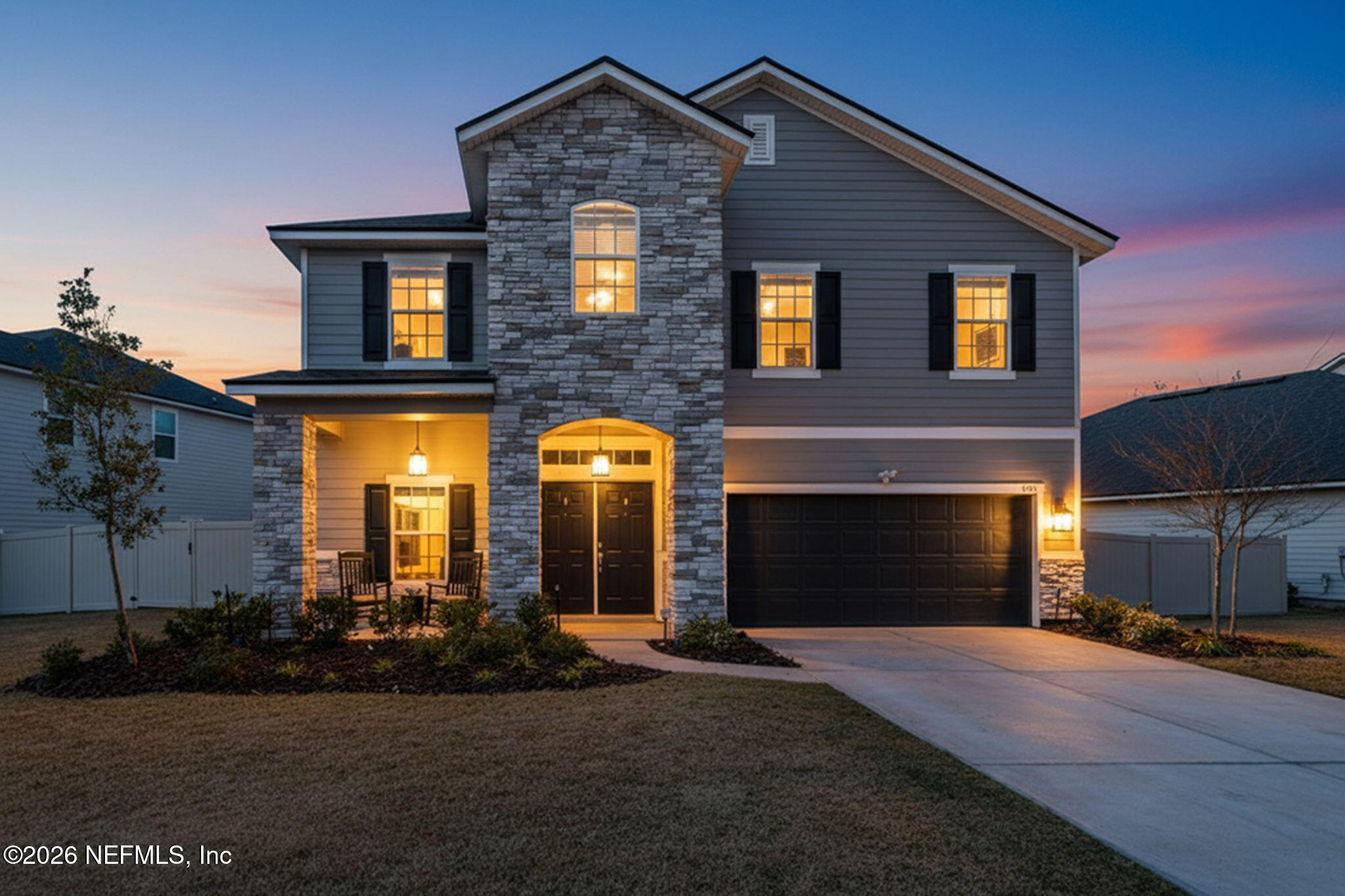 623 Ivory Palm Road Orange Park, FL 32073 - Photo 2 of 73 a front view of a house with a yard and garage