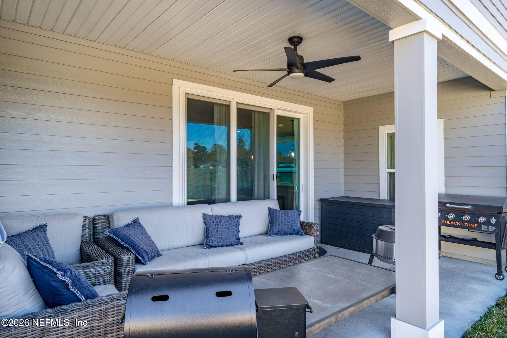 623 Ivory Palm Road Orange Park, FL 32073 - Photo 46 of 73 a living room with furniture and a large window