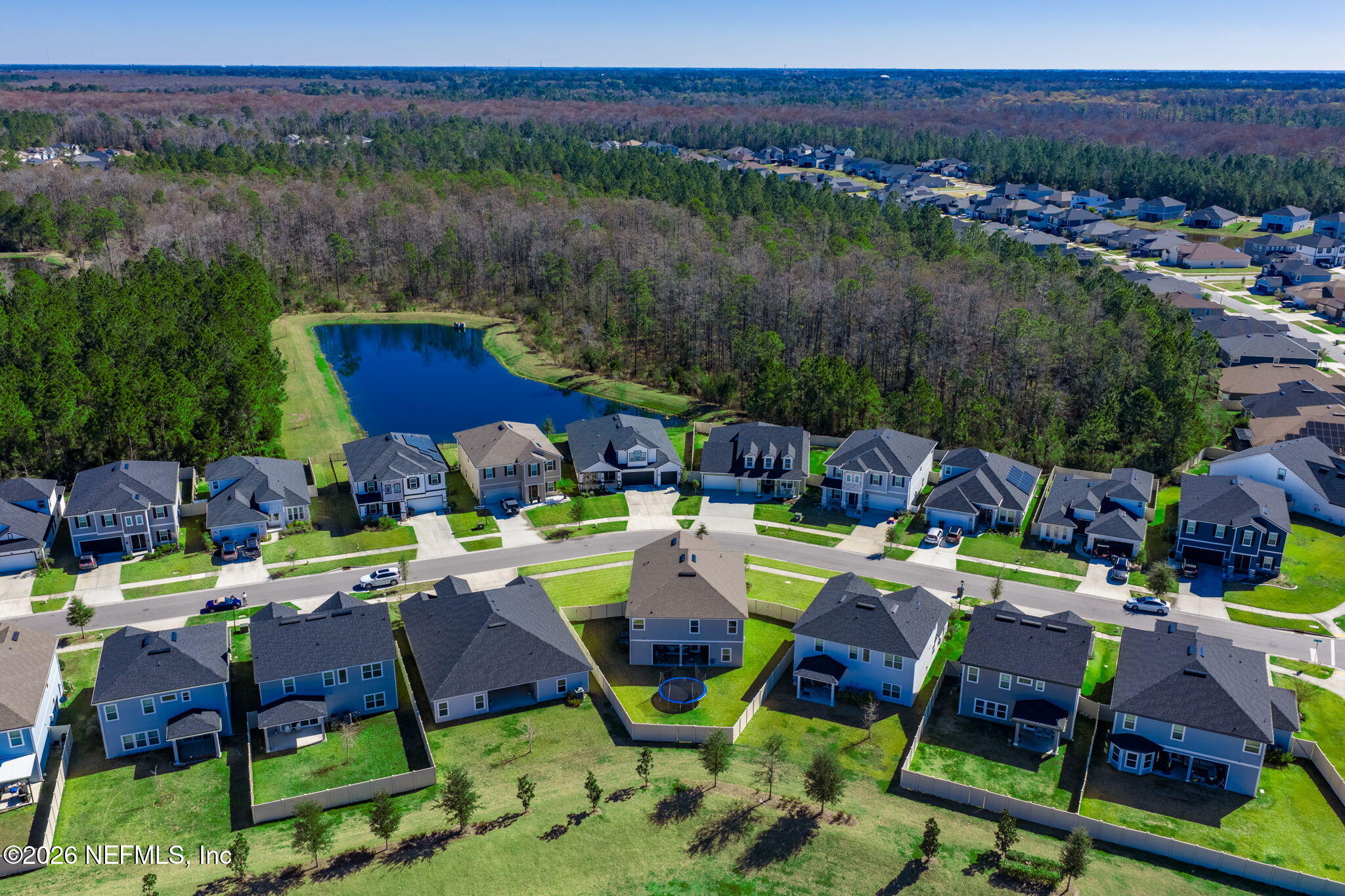 623 Ivory Palm Road Orange Park, FL 32073 - Photo 55 of 73 an aerial view of a chairs and table in patio