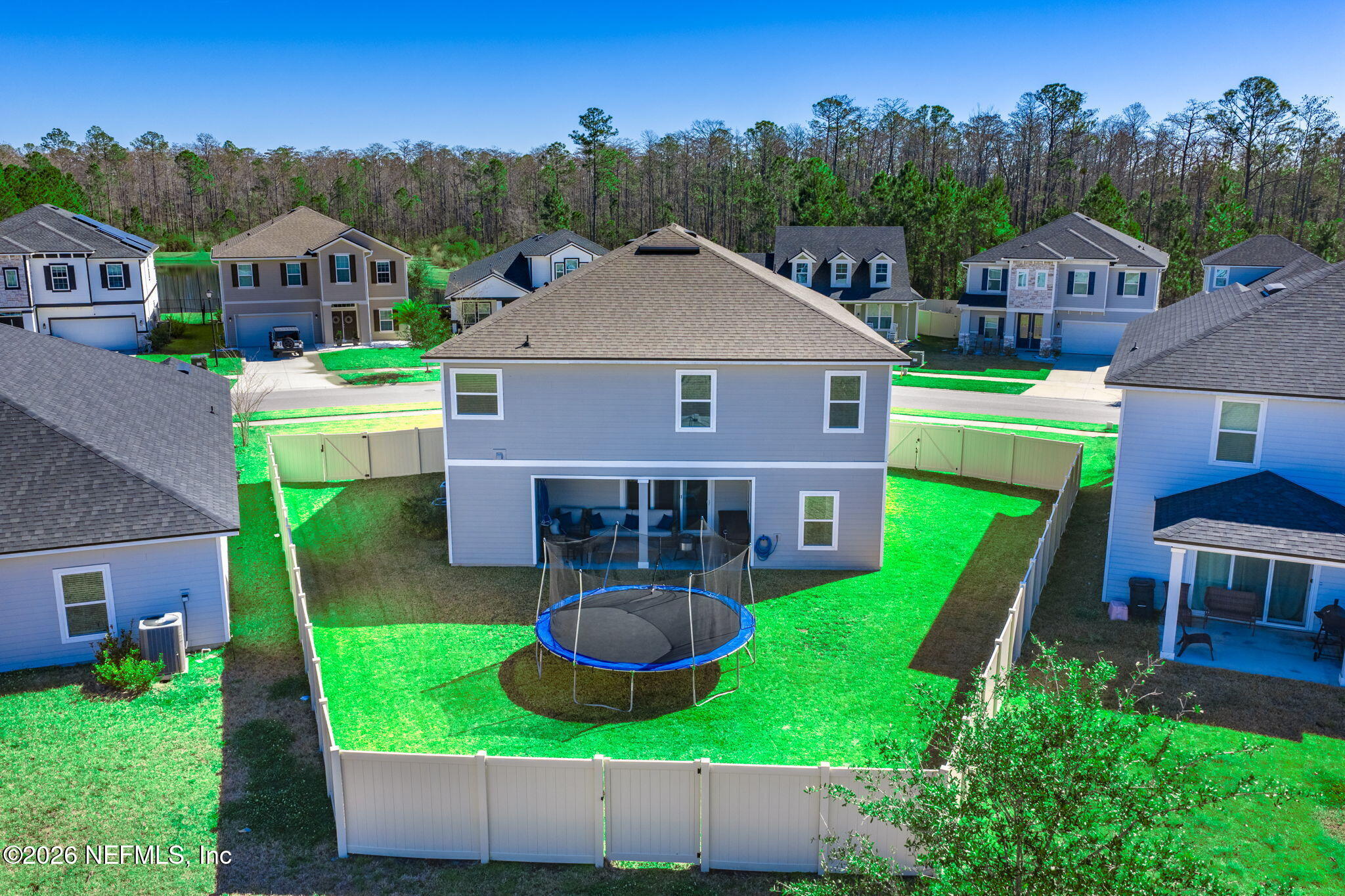 623 Ivory Palm Road Orange Park, FL 32073 - Photo 56 of 73 a aerial view of a house with swimming pool garden view and a fire pit