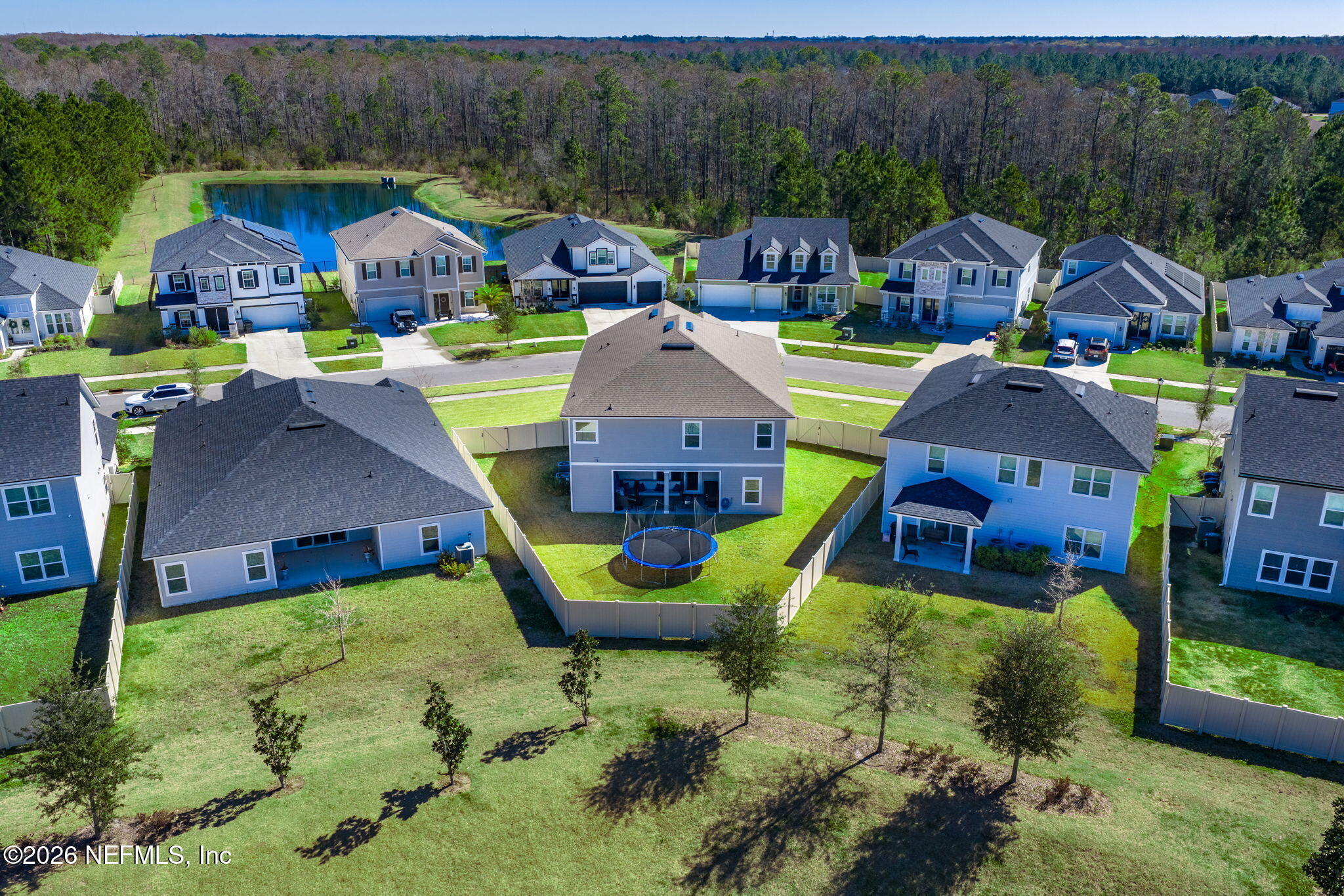 623 Ivory Palm Road Orange Park, FL 32073 - Photo 57 of 73 an aerial view of a house with swimming pool and large trees