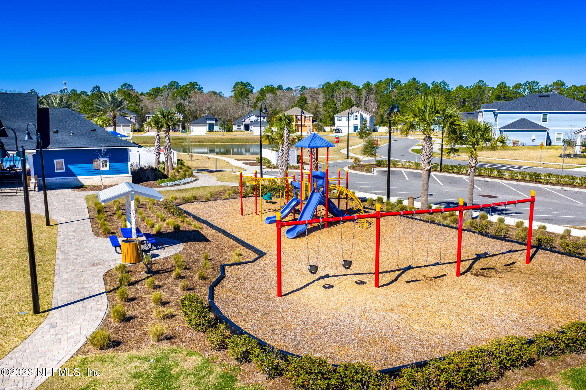 623 Ivory Palm Road Orange Park, FL 32073 - Photo 63 of 73 a view of a swimming pool with a table and chairs