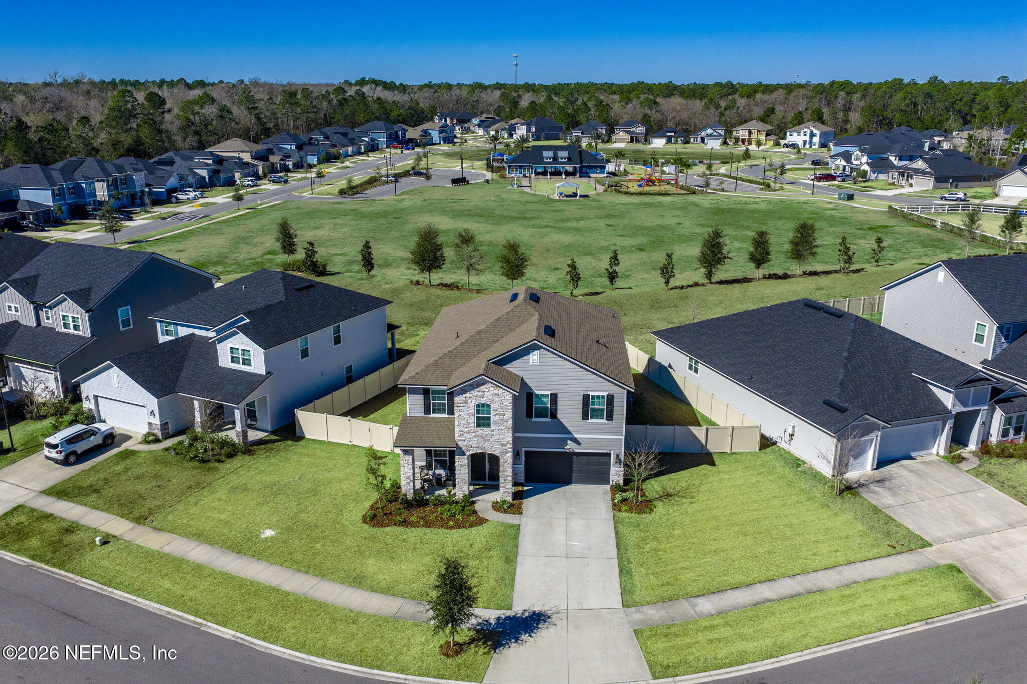 623 Ivory Palm Road Orange Park, FL 32073 - Photo 64 of 73 an aerial view of multiple houses with a yard