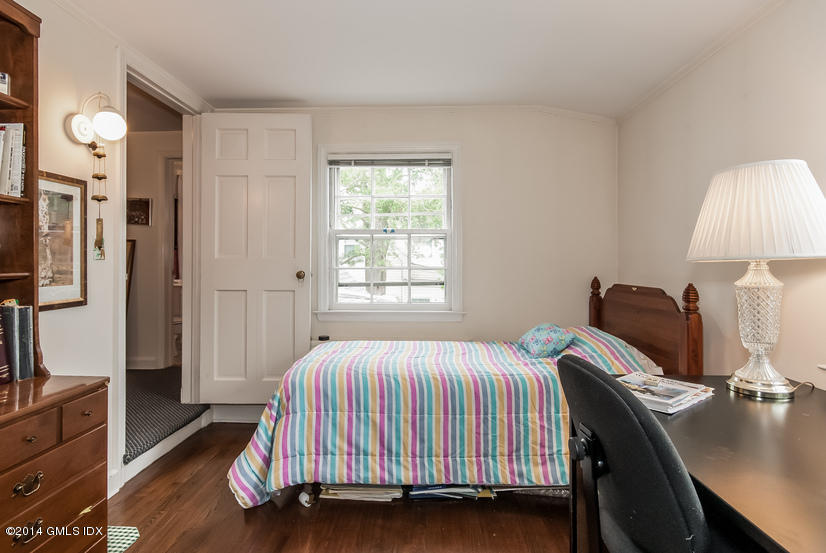 9 Linwood Avenue Riverside, CT 06878 - Photo 14 of 23 a bedroom with a bed and a dresser