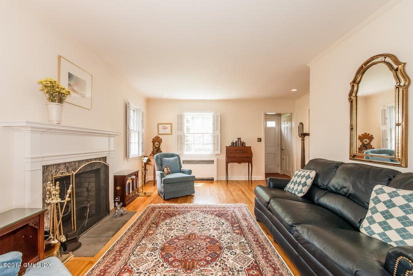 9 Linwood Avenue Riverside, CT 06878 - Photo 3 of 23 a living room with furniture and a fireplace