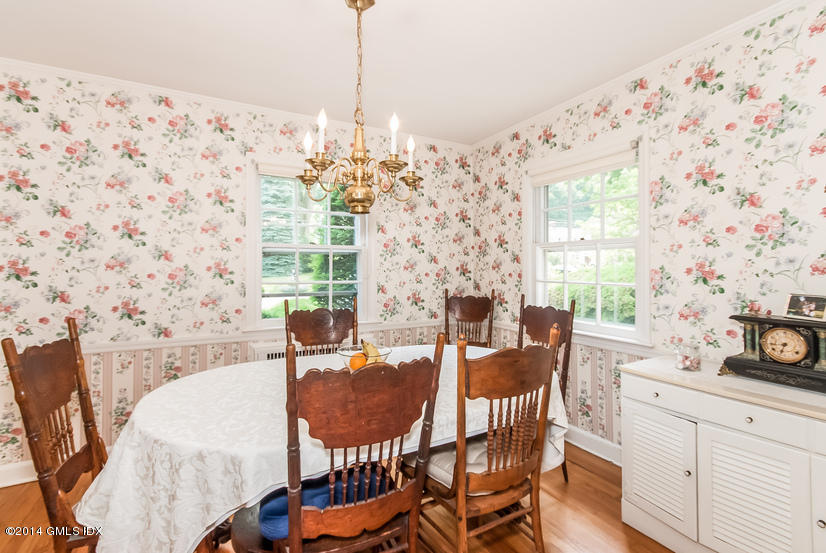 9 Linwood Avenue Riverside, CT 06878 - Photo 4 of 23 a view of a dining room with furniture and chandelier